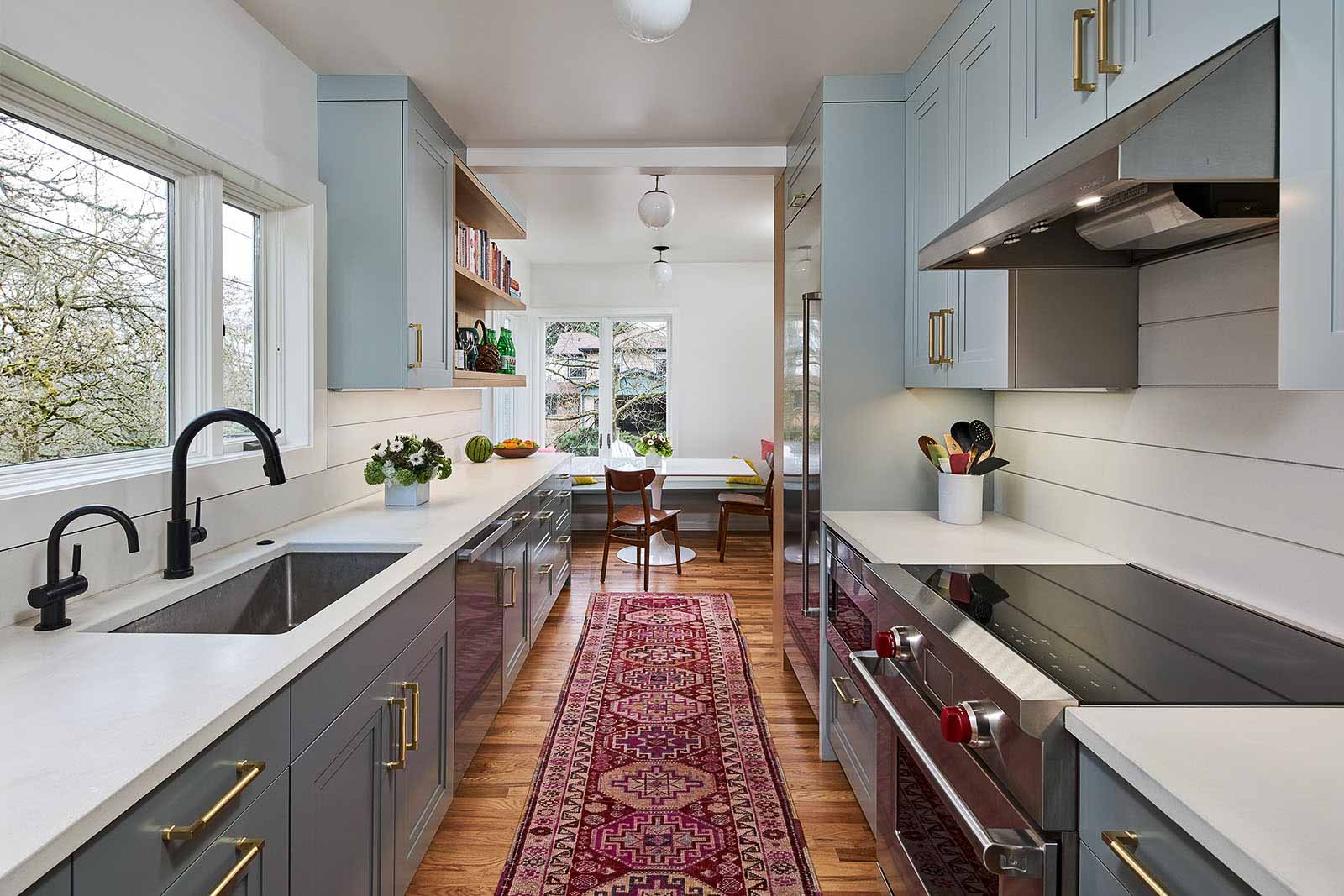 beautiful modern kitchen with colorful rug and minimalistic style